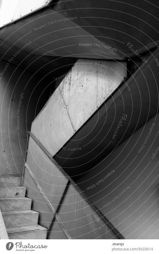 Schwarzweißes Treppenhaus Metall geometrisch eckig Architektur grau authentisch Wand kalt dunkel Beton Brutalismus martialisch