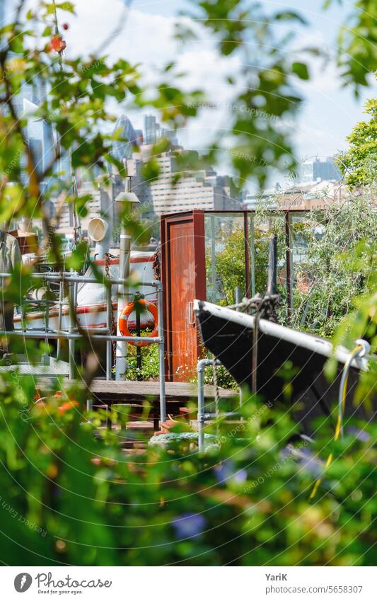 Hausboot-Garten in London Gartengestaltung Gartenkunst gartenbau hausboot london Gartenpflanzen Gartenblume pfanzen Pflanze blumen nutzgarten ziergarten