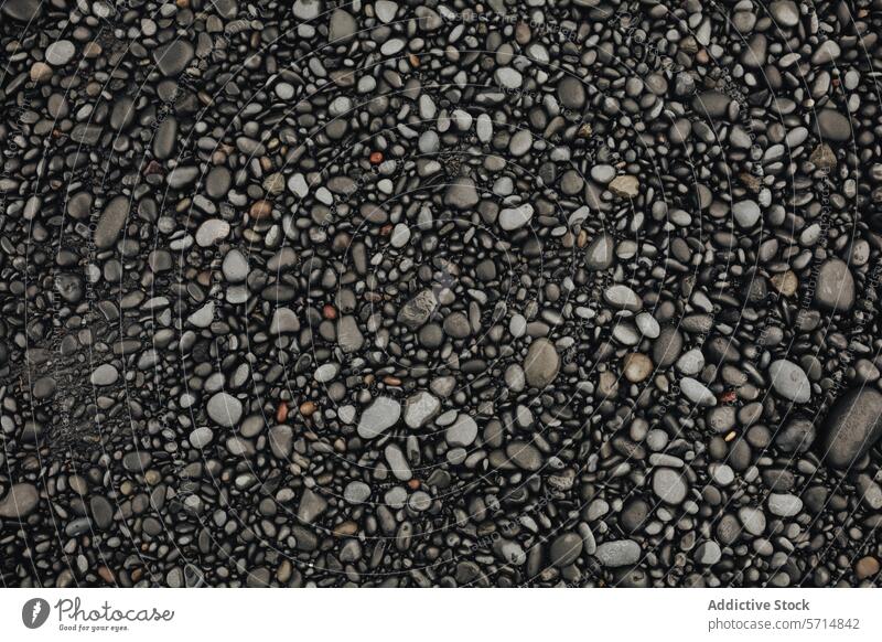Strukturierter Kieselsteinstrand in Island Kieselsteine Strand Textur Nahaufnahme Muster natürlich Stein Farbe Form vielfältig felsig Ufer geologisch im Freien