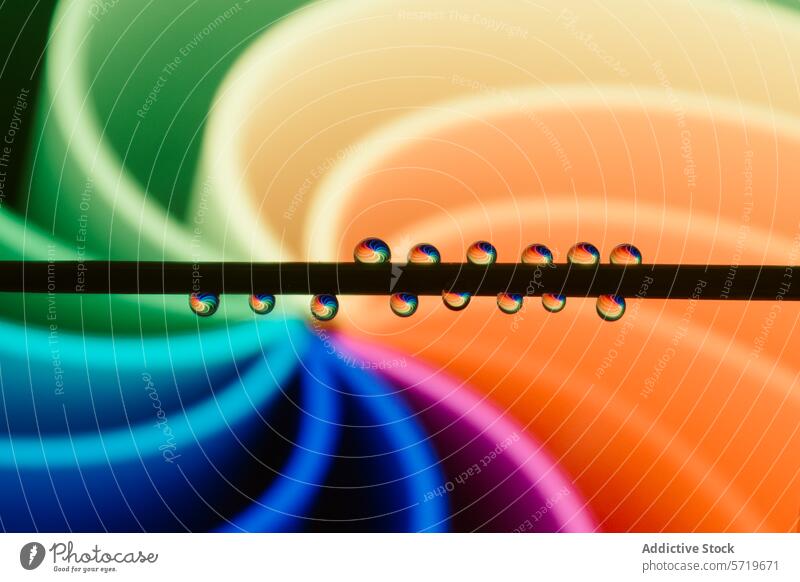Abstraktes Spektrum in reflektierenden Tröpfchen abstrakt Farbe Wasser Reflexion & Spiegelung pulsierend hell Regenbogen Makro Nahaufnahme kreisen Muster Design