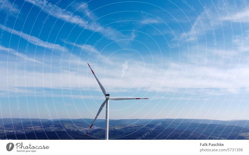 Wind turbines, green future with wind energy plant generate source cloud renewable energy electrical business wing wheel blade engine rotation resource windfarm