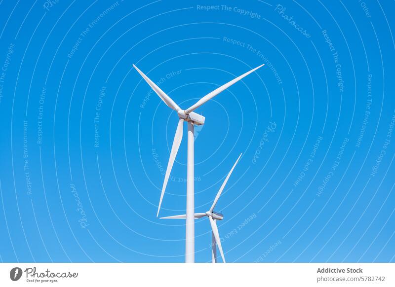 Nachhaltige Energie aus Windkraftanlagen vor blauem Himmel Erneuerbare Energie nachhaltig Blauer Himmel Technik & Technologie umgebungsbedingt sauberer Strom
