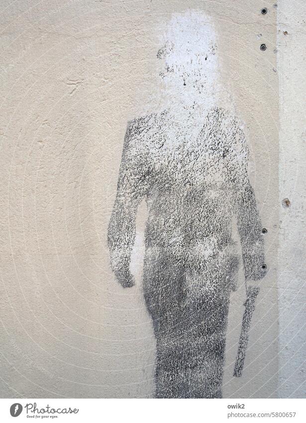 Schlägertyp Gestalt Umriss Silhouette Wand Hauswand verputzt Mann Figur Typ Schlagstock Kratzer zerkratzte Oberfläche Fassade Wandmalerei Detailaufnahme
