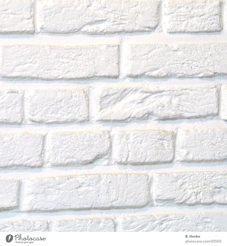 Ein Stück Wand Mauer weiß Muster hell Stein Detailaufnahme Strukturen & Formen