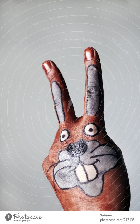 Mein Name ist HandHase Hase & Kaninchen Comic Comicfigur gemalt Kreativität gezeichnet bemalt Körpermalerei Ohr Freundlichkeit niedlich schön lustig Farbfoto
