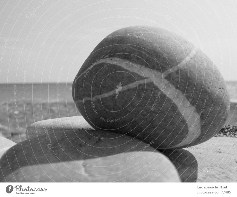 Strand-Stein Kies Horizont Sonne Himmel Schatten Strukturen & Formen Sand