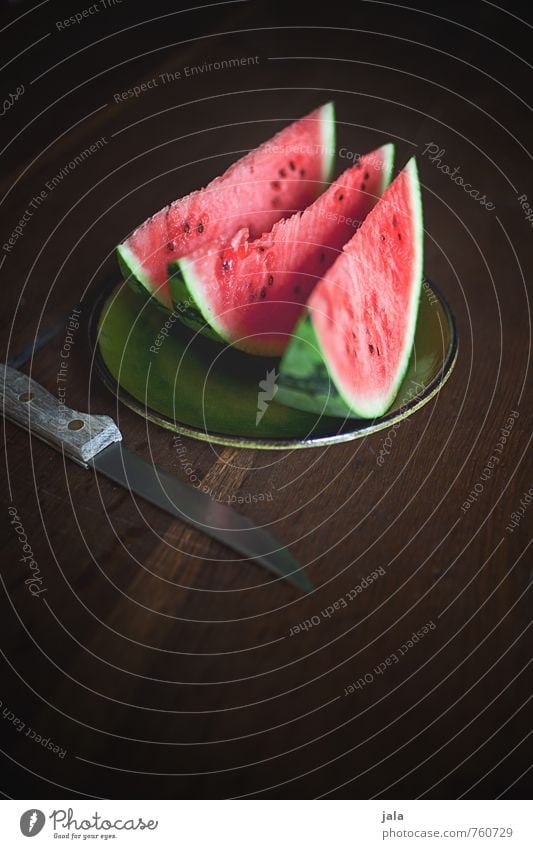 melone Lebensmittel Frucht Melonen Ernährung Bioprodukte Vegetarische Ernährung Fingerfood Teller Messer Gesundheit lecker süß Appetit & Hunger Holztisch