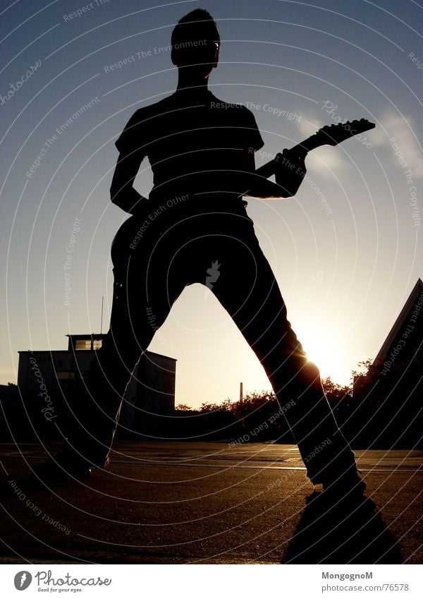 ROCK ON Rocker Gitarrenspieler Sonnenuntergang Wolken guitar Rockmusik Rock 'n' Roll Musik Himmel