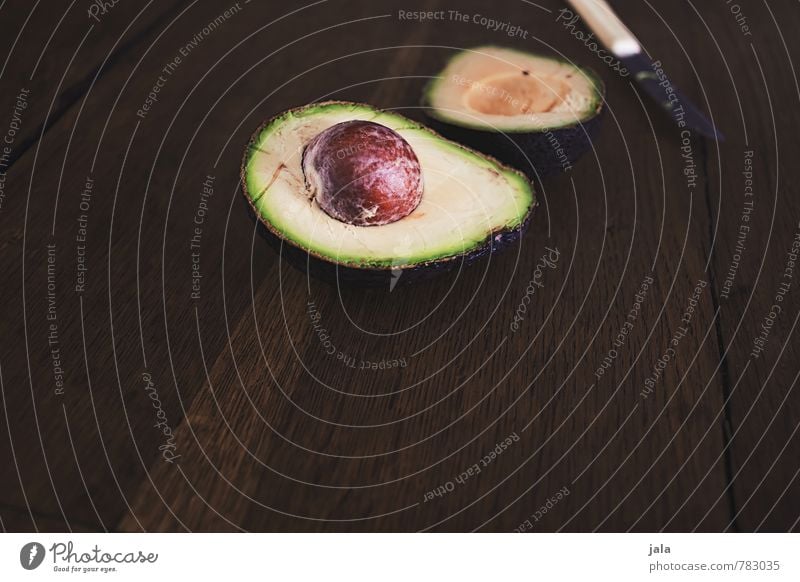 avocado Lebensmittel Gemüse Avocado Ernährung Bioprodukte Vegetarische Ernährung Messer Gesundheit lecker natürlich Appetit & Hunger Holztisch Gesunde Ernährung