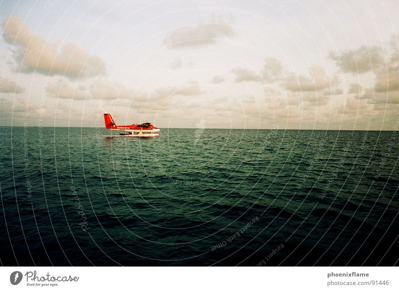 airtaxi Malediven Ferien & Urlaub & Reisen Flugzeug rot Meer Asien sea holiday
